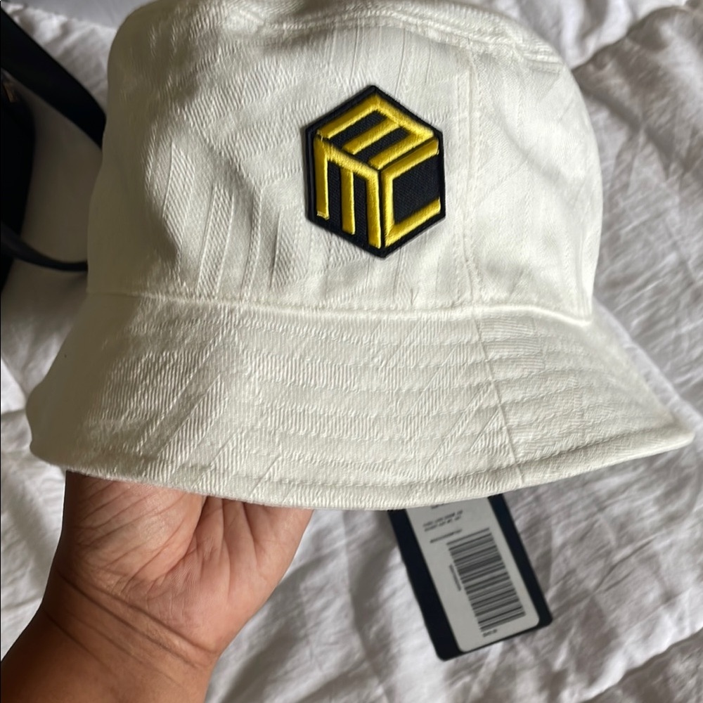 MCM White Bucket Hat with Yellow and Black Logo